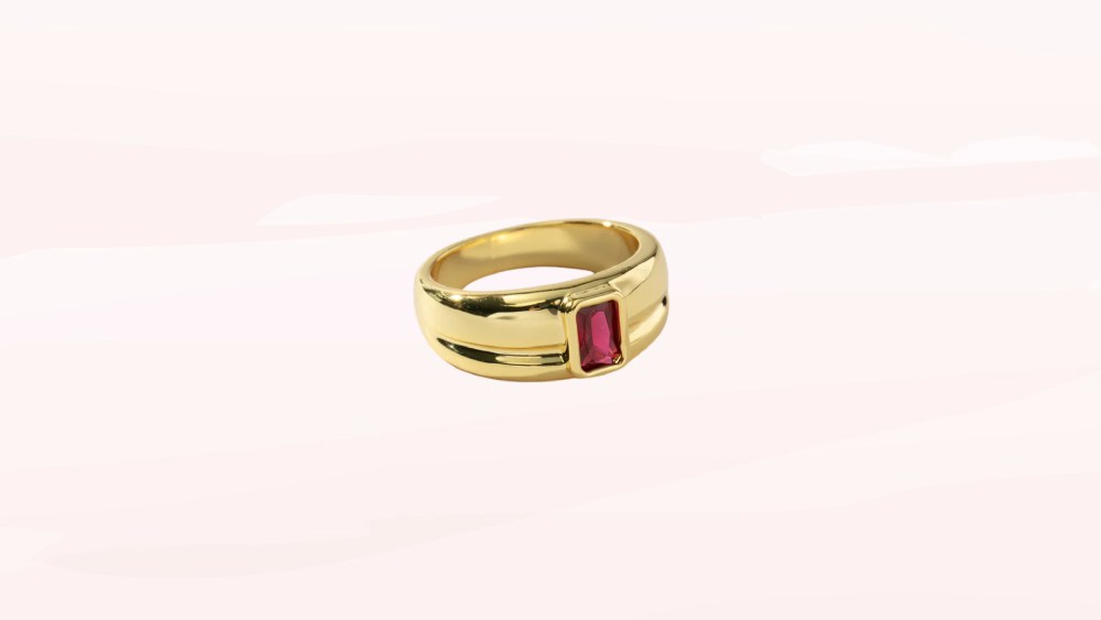 Gold ring with birthstone centerpiece