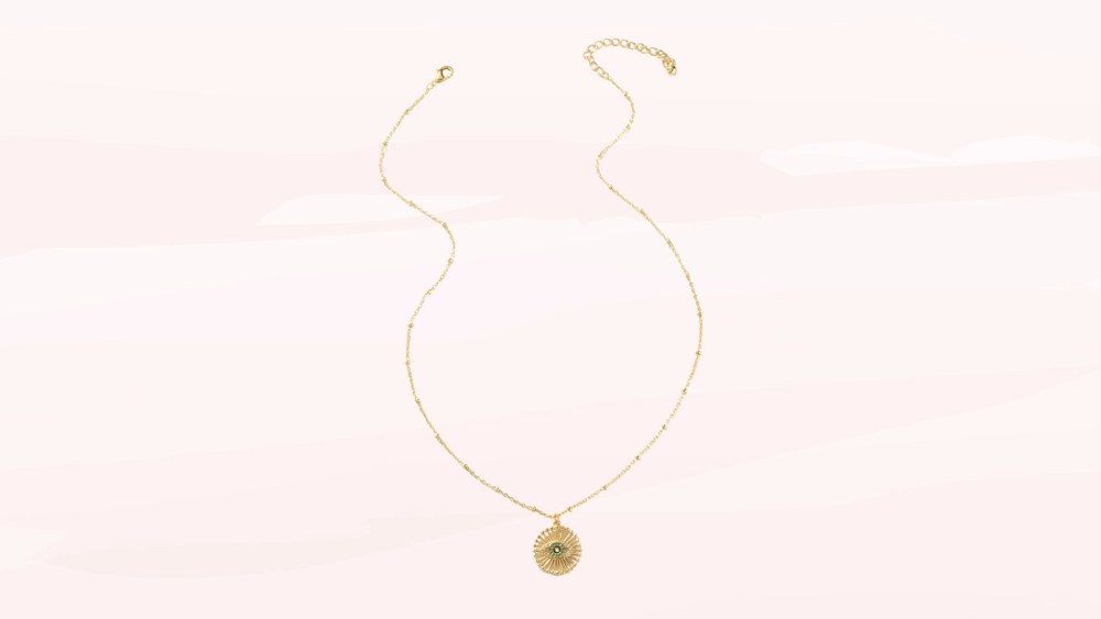 Gold necklace with evil eye