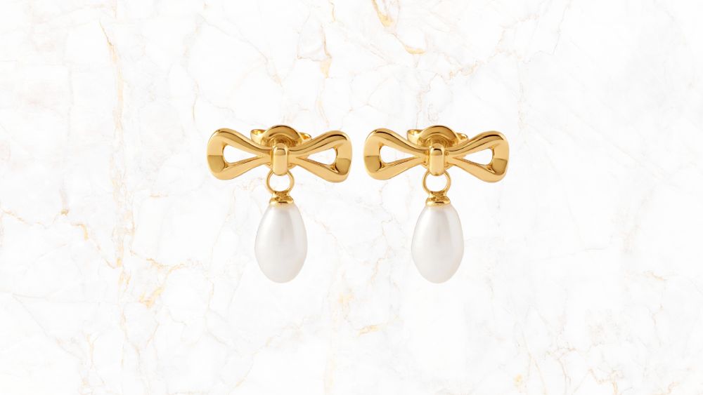 Bow pearl earrings with elegant touch