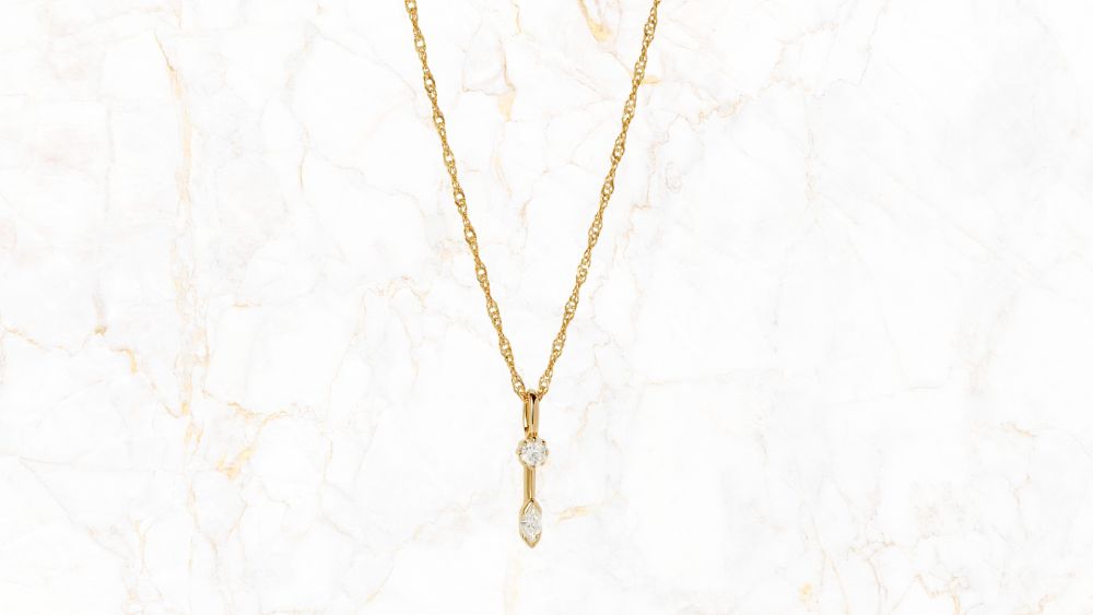 Marquise solitaire diamond necklace in gold